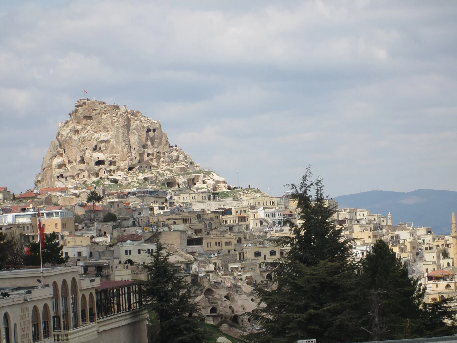 Uchisar Castle rising above the town's stone buildings