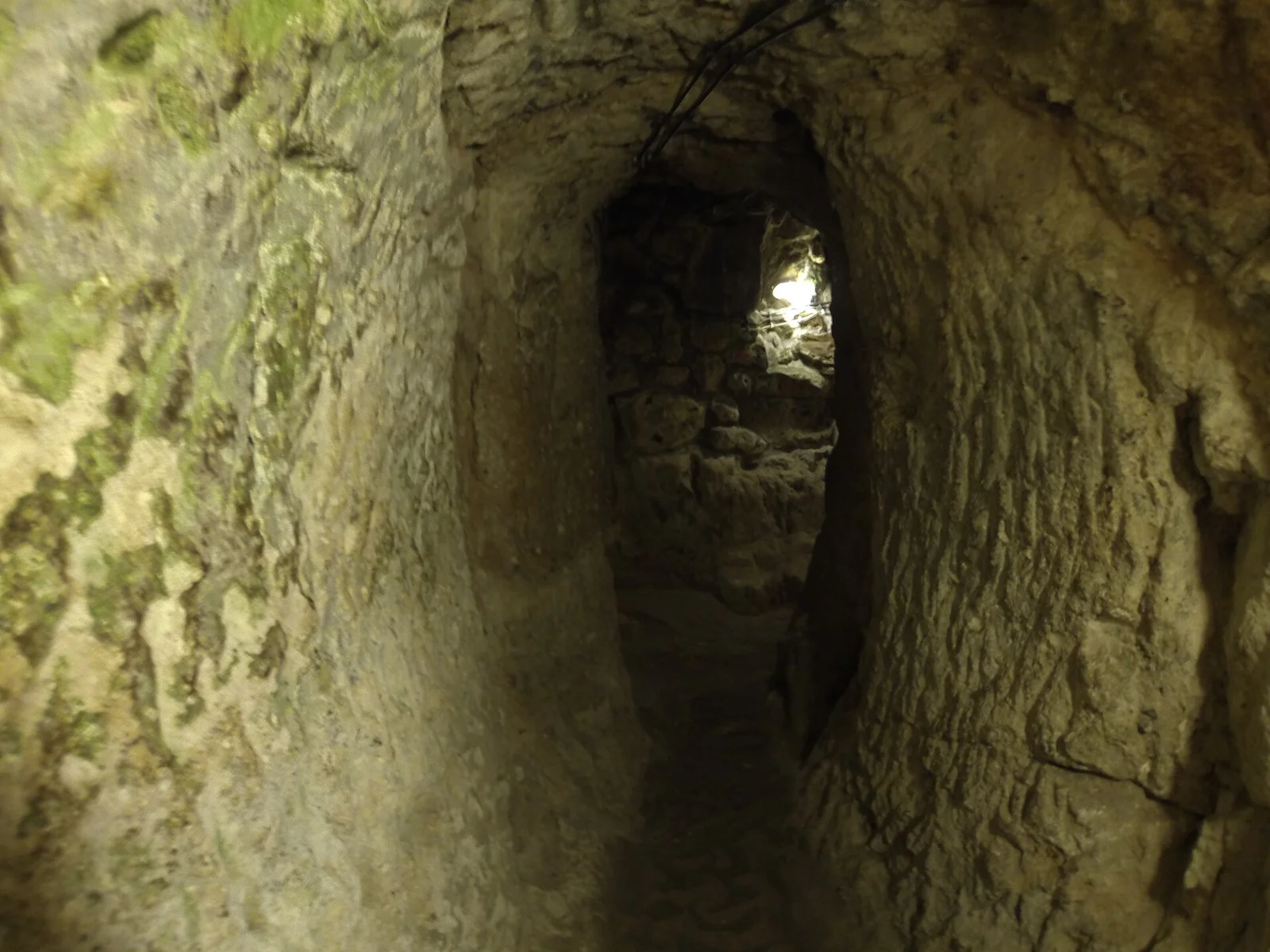 A narrow rock-cut passage opening in Derinkuyu
